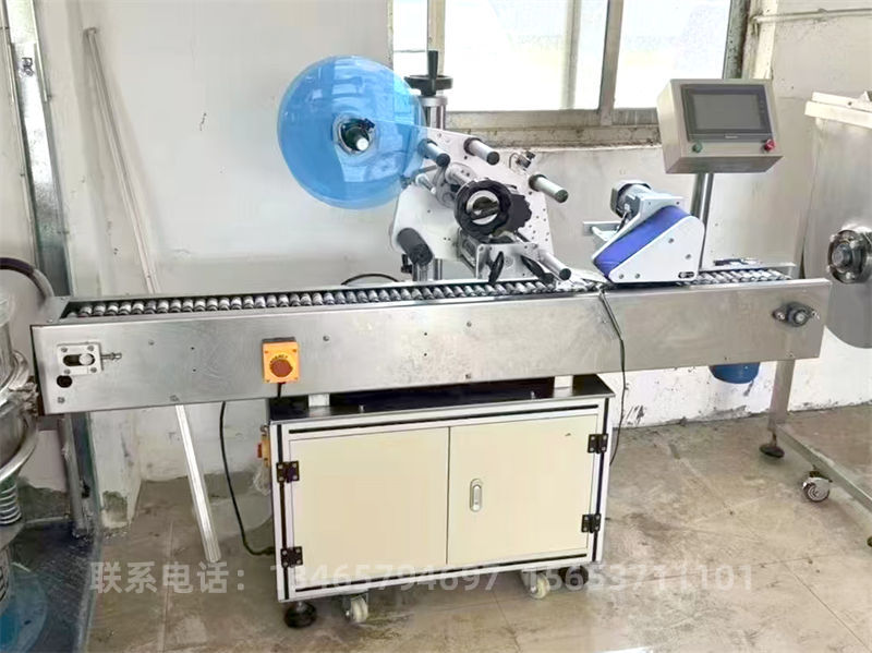 滾輪式平面貼標(biāo)機.jpg